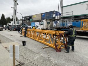 Bigfoot Crane Company performing pre-lift planning for a tower crane rental at a construction site.